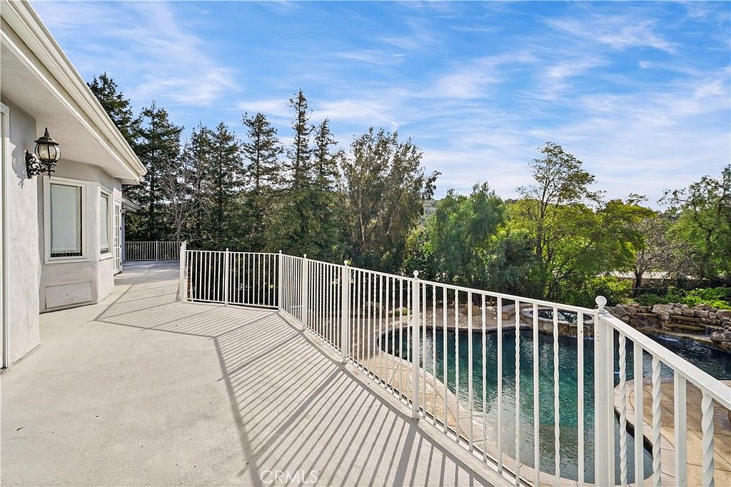 Balcony terrace above the grounds at 22510 La Quilla Dr, Chatsworth