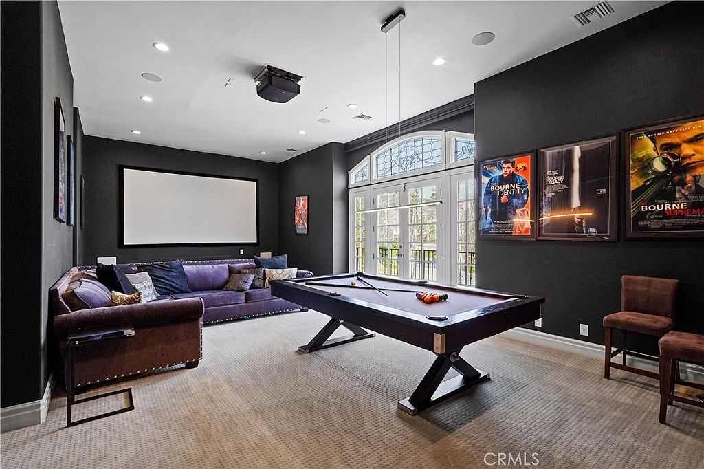 Theater and game room with pool table at 22510 La Quilla Dr, Chatsworth
