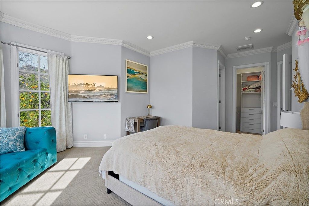 Bedroom suite with walk-in closet at 22510 La Quilla Dr, Chatsworth